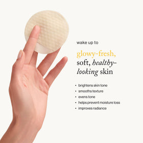 goop Beauty model applying pad to cheek for smoother skin