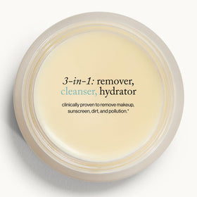 goop balm being massaged into dry skin, demonstrates effective waterproof makeup removal