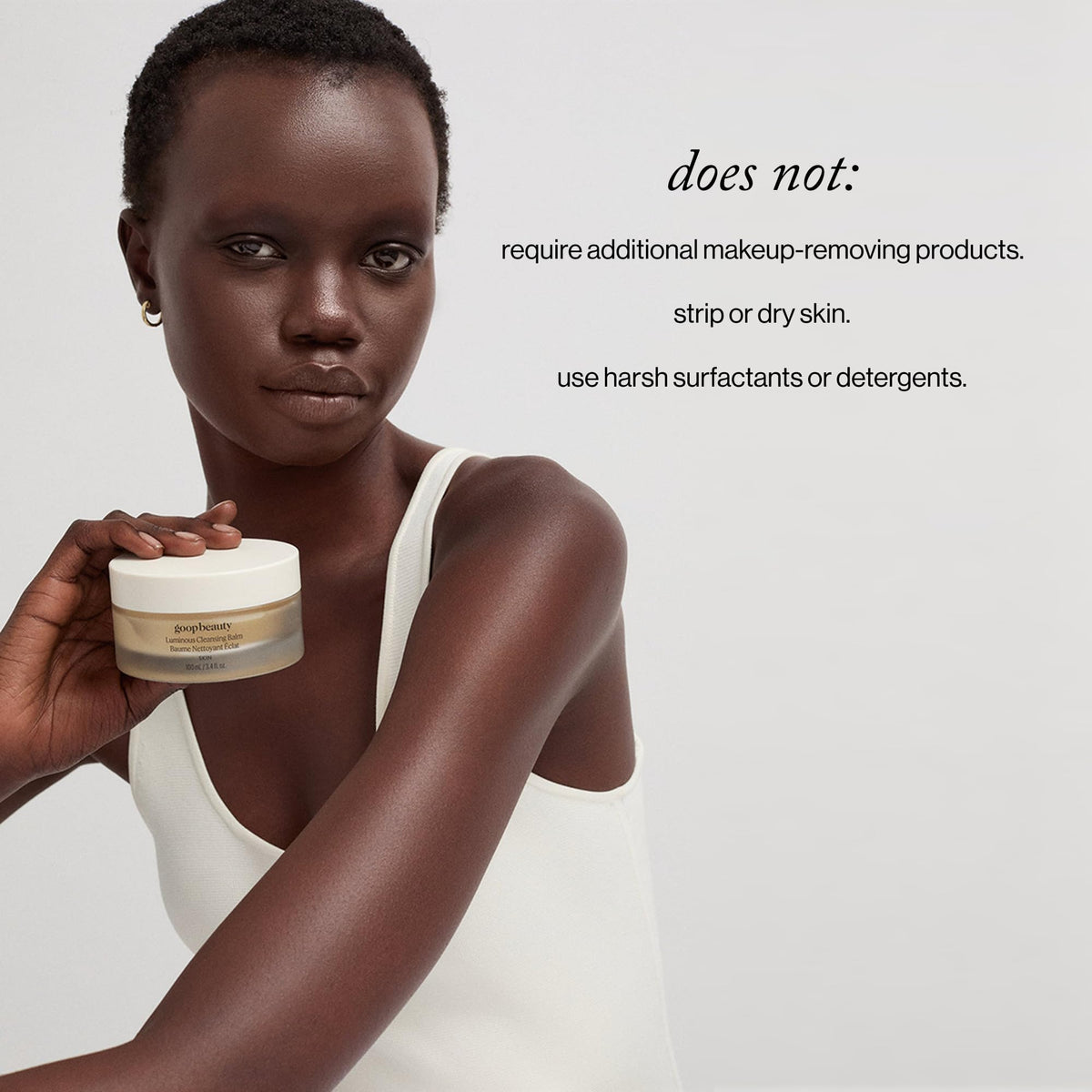 goop whipped balm texture close-up illustrating silky melt, conveys gentle makeup removal