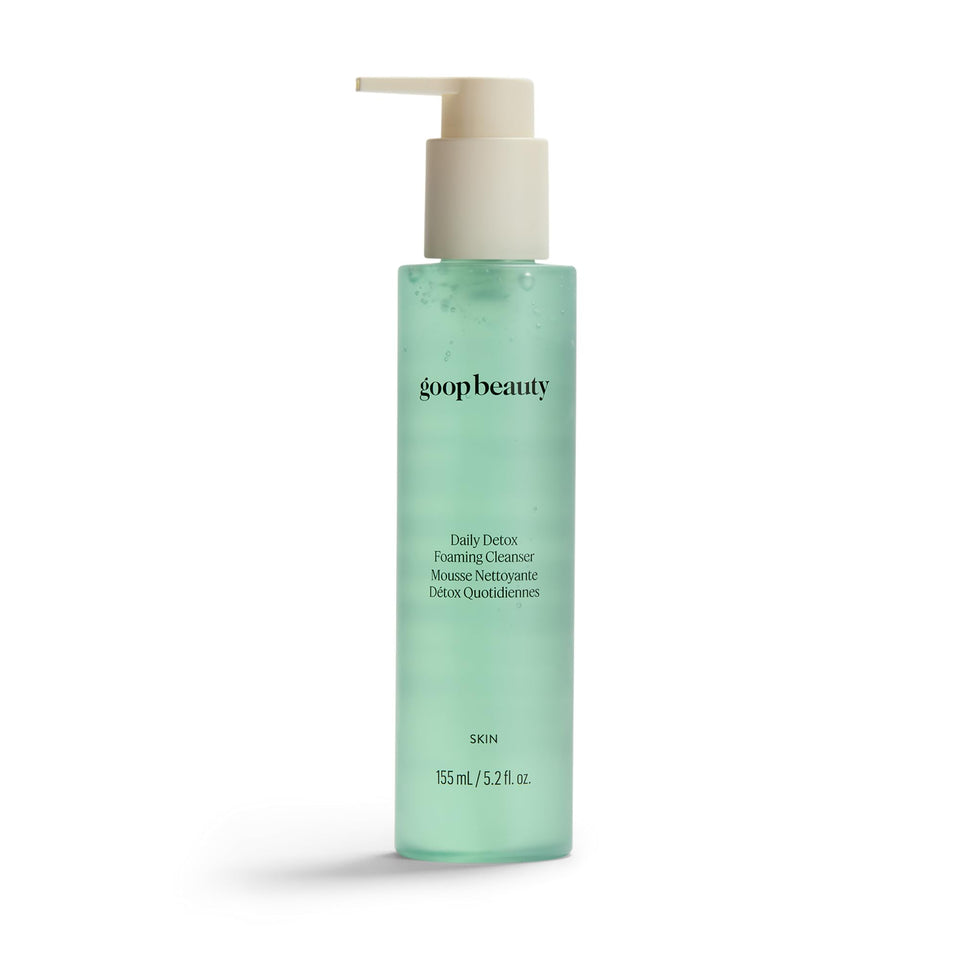goop cleanser front view showing bottle and branding benefits