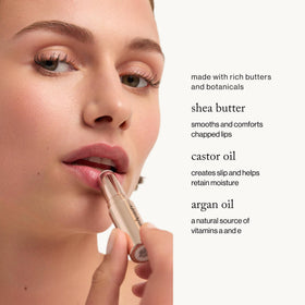 goop lip balm garnet swatch on skin showing translucent color benefit: buildable warm tint