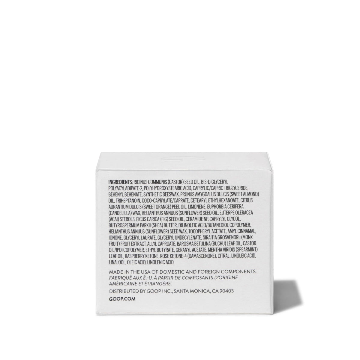 bedside scene with goop lip mask open, suggesting overnight use and sustained hydration benefit