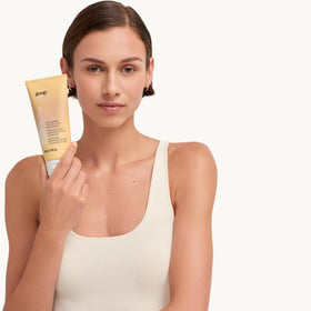 goop whipped polish texture on spoon showing cling-to-skin benefit
