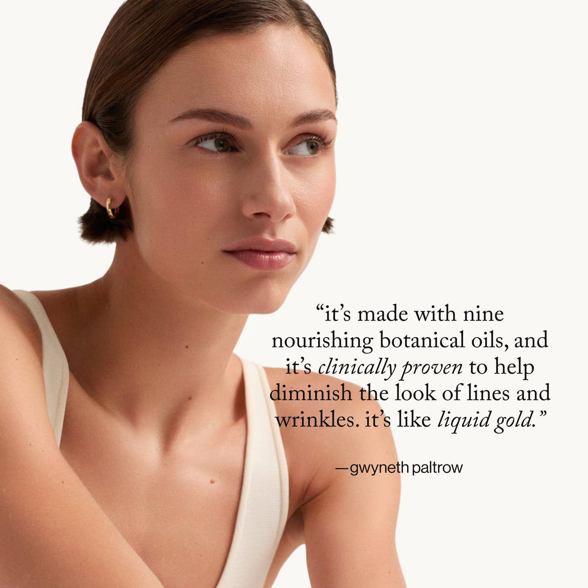 goop smoothing oil onto neck and décolletage to show extended coverage