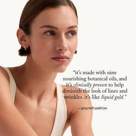 goop smoothing oil onto neck and décolletage to show extended coverage