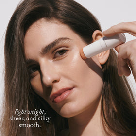 goop highlighter applied to cheek showing natural cool-pink radiance and lift