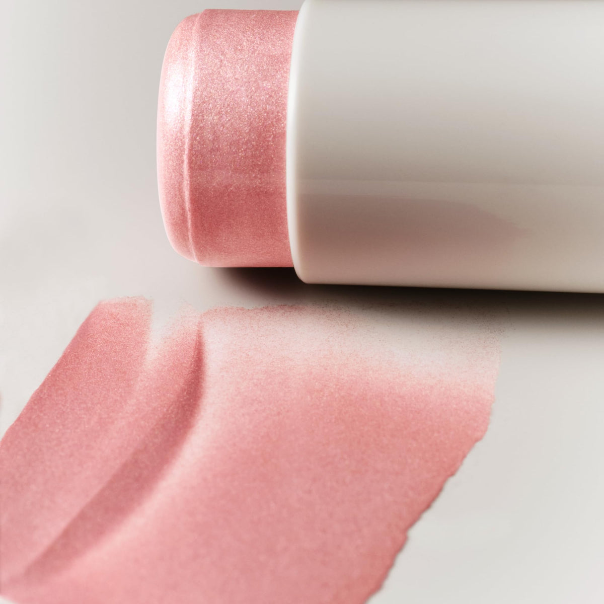 goop highlighter stick open with visible product ready for quick application