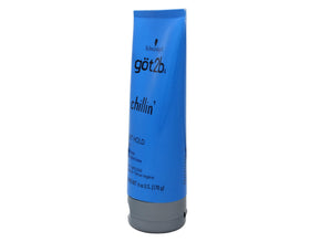 Model using Got2B gel to create a slick-back style highlighting polished, controlled look