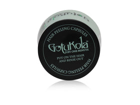 Gotukola applied to hair in hand demonstrating easy spreadability