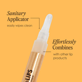 Grande Cosmetics GrandeLIPS next to a coin for scale demonstrating travel-friendly size