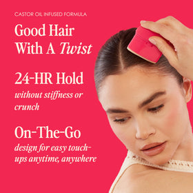 Grande Cosmetics GrandeHAIR applying stick to bun for sleek frizz-free finish