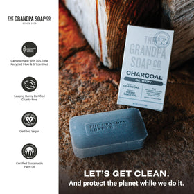 Grandpa Soap Company charcoal bar with mint leaves and hemp seeds illustrating natural ingredients
