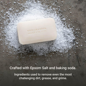 Lather in hand from Grandpa Soap Company soap demonstrating effective grease removal