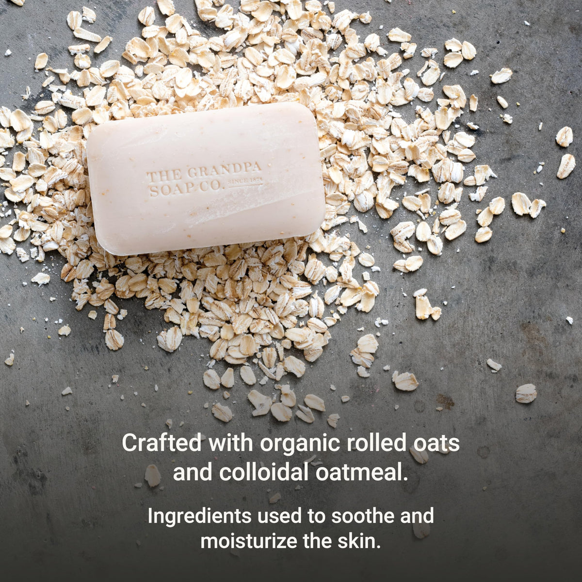 The Grandpa Soap Company rolled oats and chamomile beside the bar highlighting natural ingredients