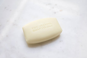 Grandpa's bar closeup texture showing soap surface and sulfur granules for effective cleansing