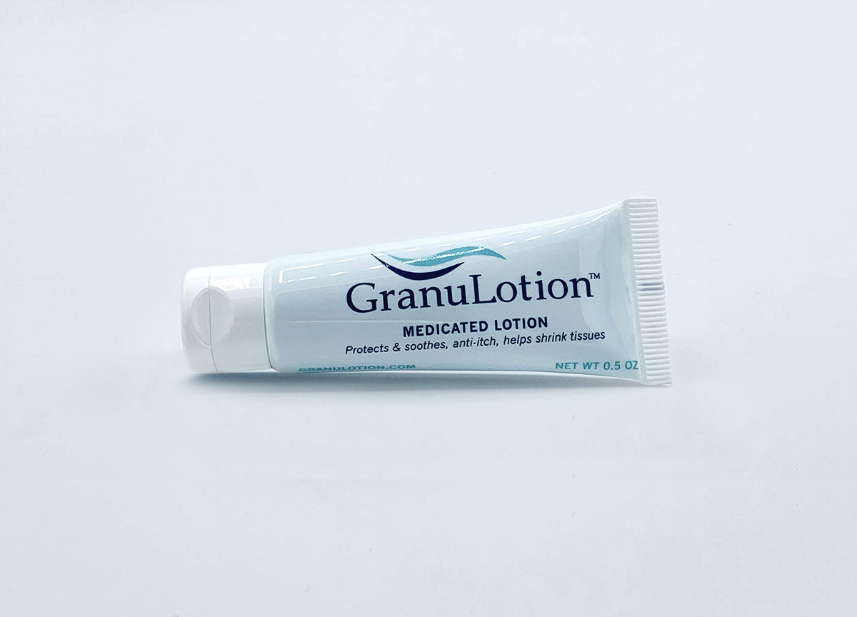 GranuLotion tube in hand demonstrating travel-friendly size and portable benefit