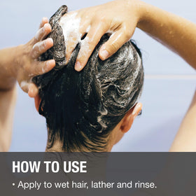GREAT CLIPS 10oz bottle held in hand showing compact size and travel-friendly benefit