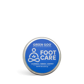 Green Goo salve applied to heel demonstrating soothing foot care and quick absorption