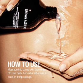 Grown Alchemist bottle in shower setting suggesting daily use convenience