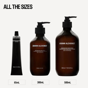 Grown Alchemist tube beside phone showing compact 65ml travel size