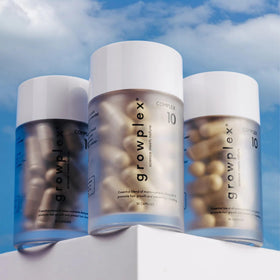 GROWPLEX bottle with natural ingredient props indicating premium formula