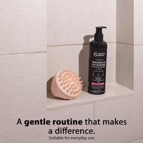 Growth Essence bottle next to travel items showing size and portability