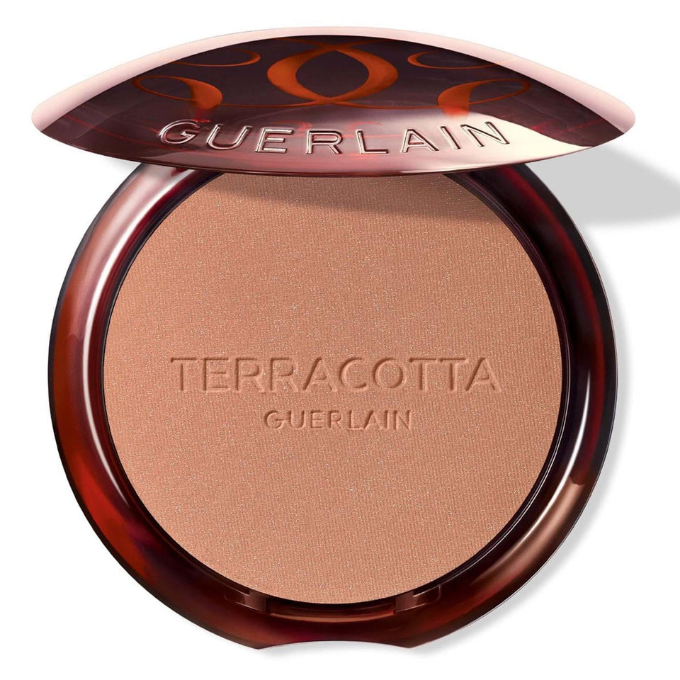 Guerlain bronzing powder compact front view showing sleek packaging and travel-ready benefit