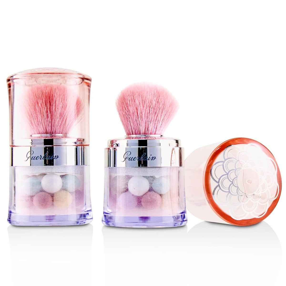 Guerlain Météorites duo front packaging showing two jars and travel brush for portable finishing