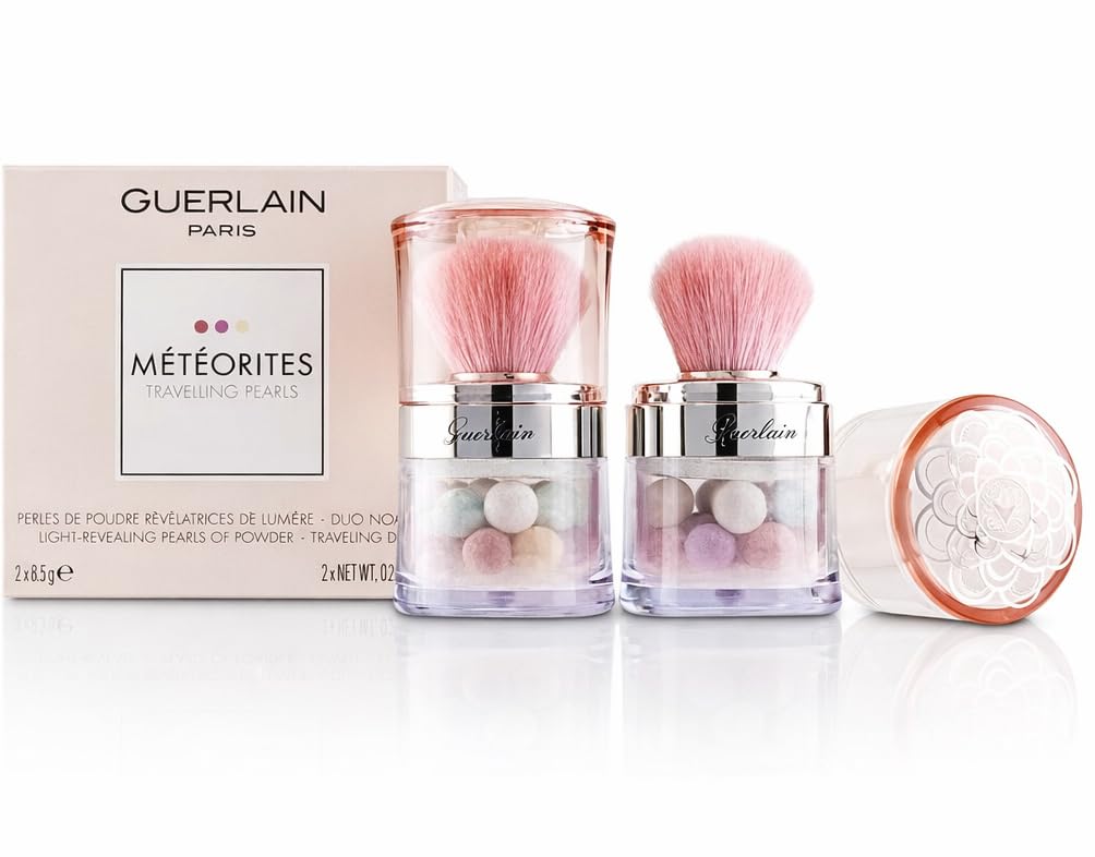 Guerlain Météorites pearls close-up texture revealing fine milled beads for soft luminosity