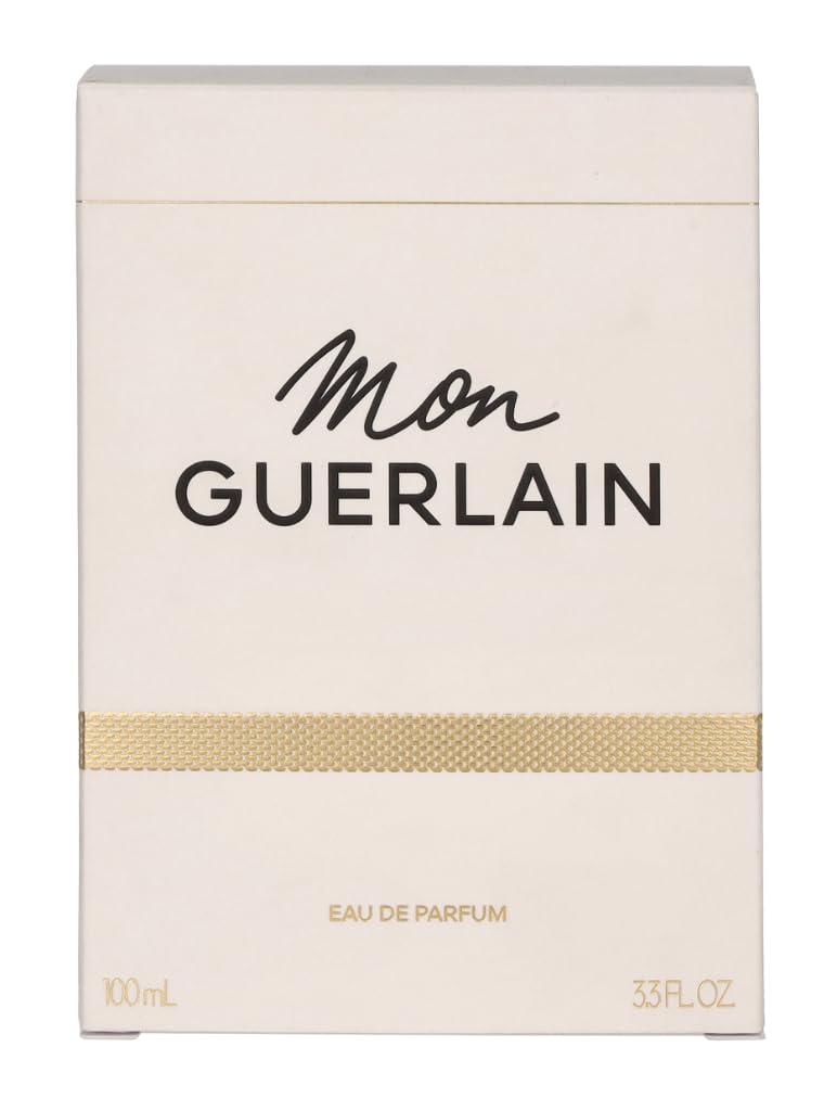 Guerlain Mon Guerlain spray in use mist over skin illustrating easy application and lasting scent