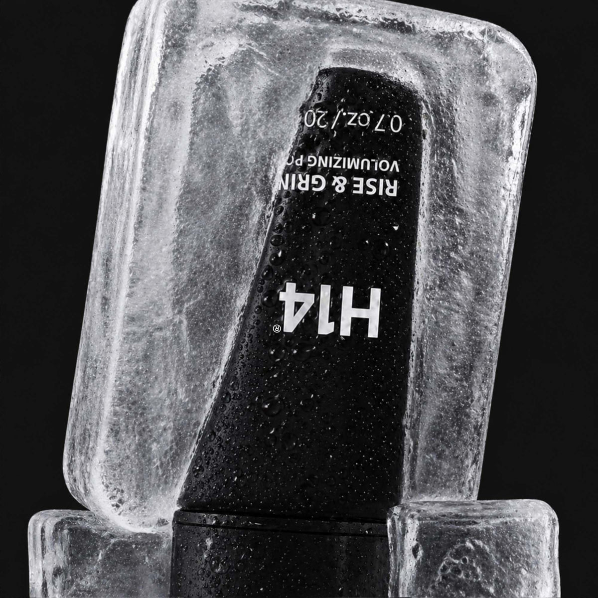 H14 close-up of powder texture highlighting matte volumizing effect