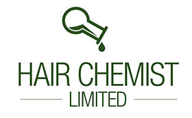 Hair Chemist shampoo on shower rack showing salon‑style supply and longevity