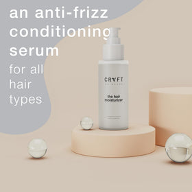 Hair Craft Co. applying serum to damp hair for frizz control benefit