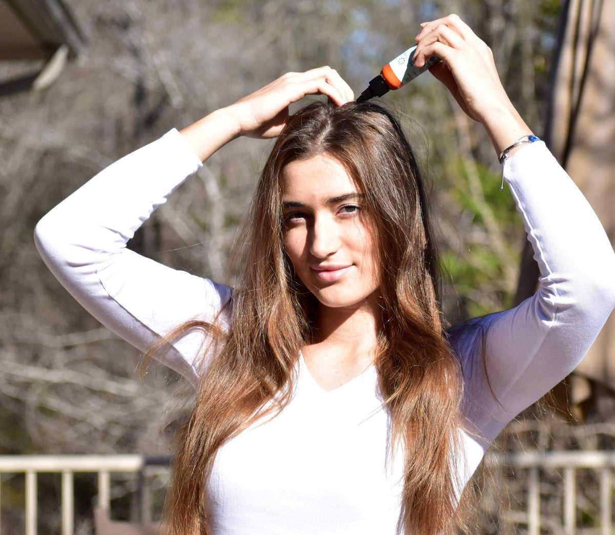Hair Dance used outdoors after workout for quick refresh on the go