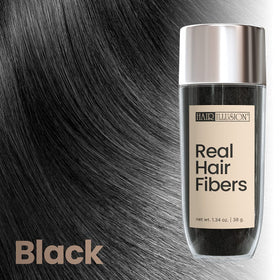 Hair Illusion pack in hand comparing 38g size for travel convenience