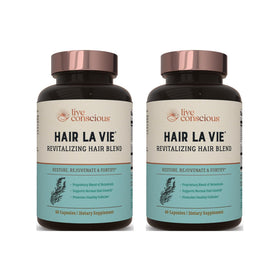 Hair La Vie Live Conscious front packaging showing two-bottle pack and benefits