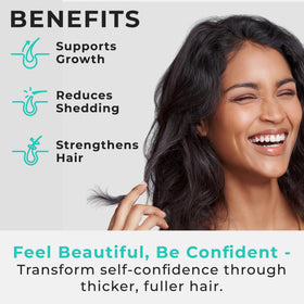 Hand holding Hair Plus MD capsules to show serving size and simple daily use benefit