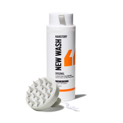 Hairstory New Wash front bottle showing label and refillable design benefits