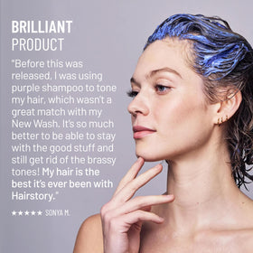 Hairstory ingredients label close-up showing aloe, jojoba and sunflower oil benefits