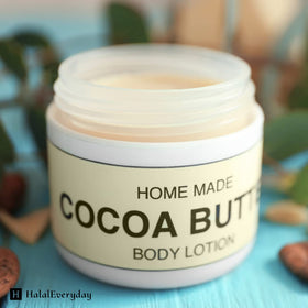 HalalEveryDay lotion bottle beside cocoa butter indicating creamy texture benefit