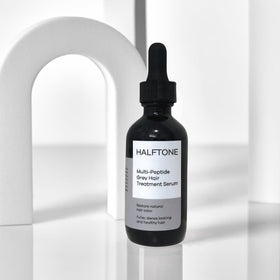 HALFTONE serum on bathroom counter suggesting daily routine convenience