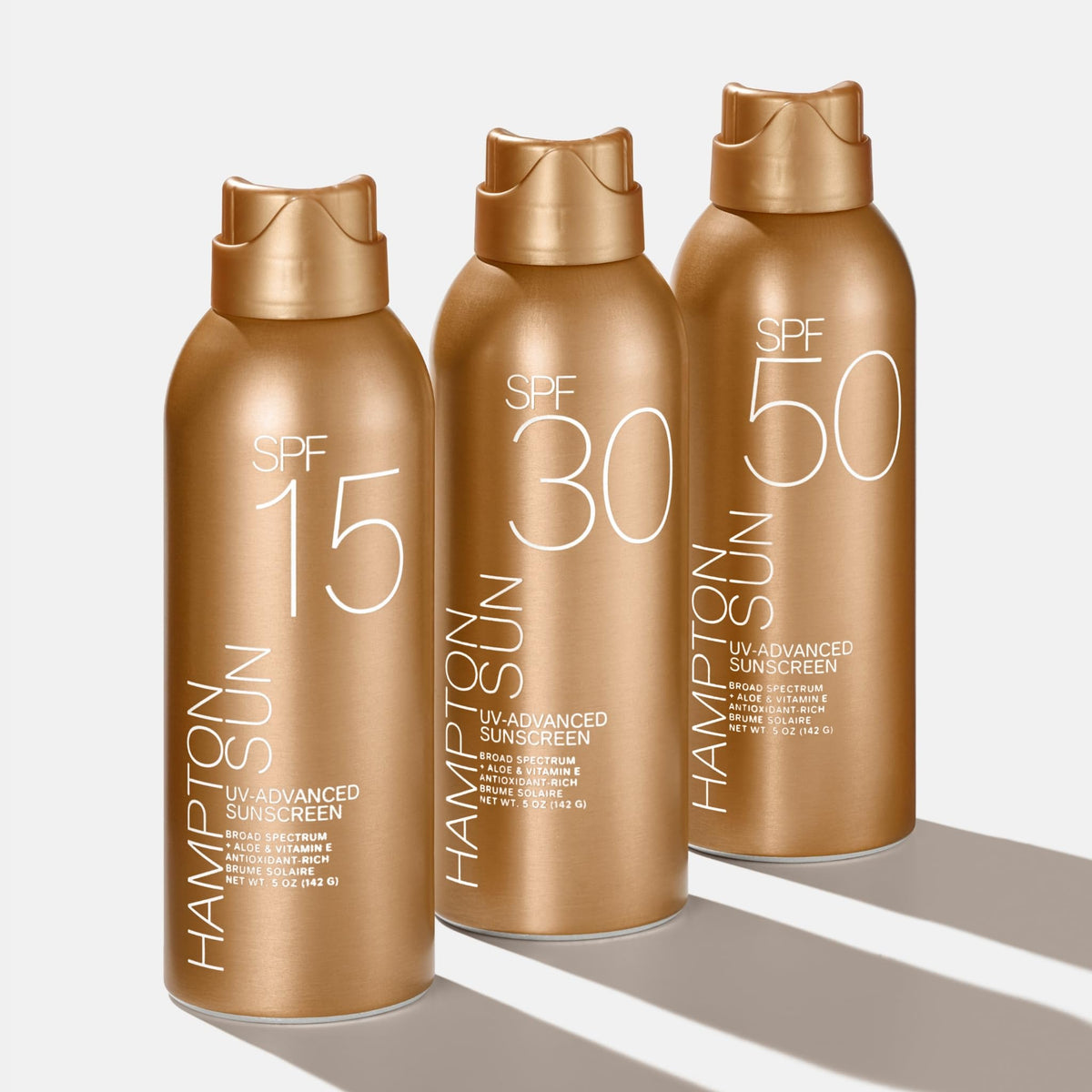 Hampton Sun sunscreen in use at beach highlighting fast application and protection