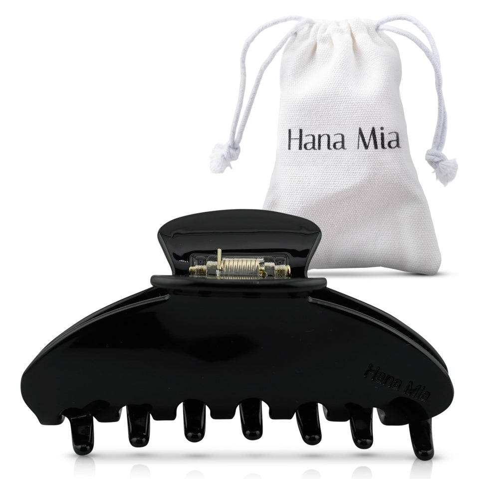 Hana Mia black clip front view showing secure hold and sleek style