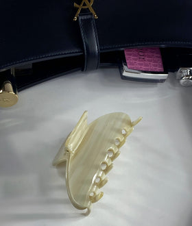Hana Mia clip inside its soft carrying pouch protecting finish and easing travel