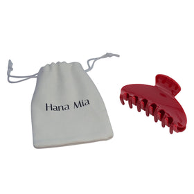 Hana Mia clip inside a purse ready for on-the-go touch-ups