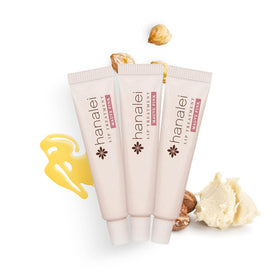 Hanalei open tube close-up showing smooth balm texture and immediate hydration