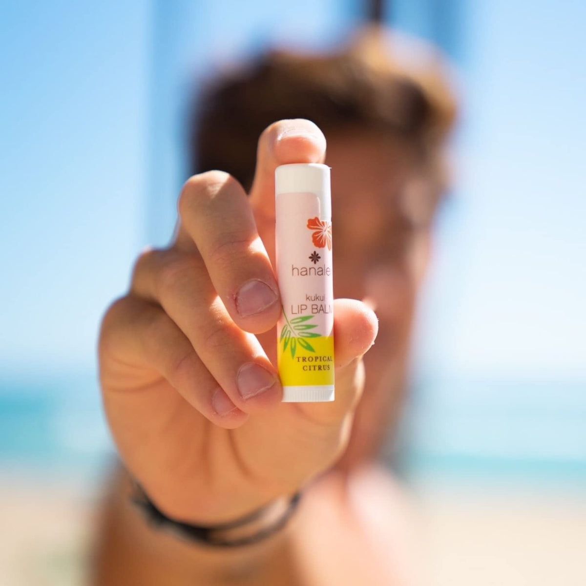 Hanalei clear balm texture close-up highlighting kukui oil sheen for moisture