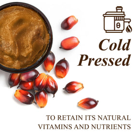 Warming Handcraft Blends Batana in hands to soften paste for easy application