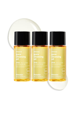 Hanskin front packaging trio showing three travel bottles and clear product benefit