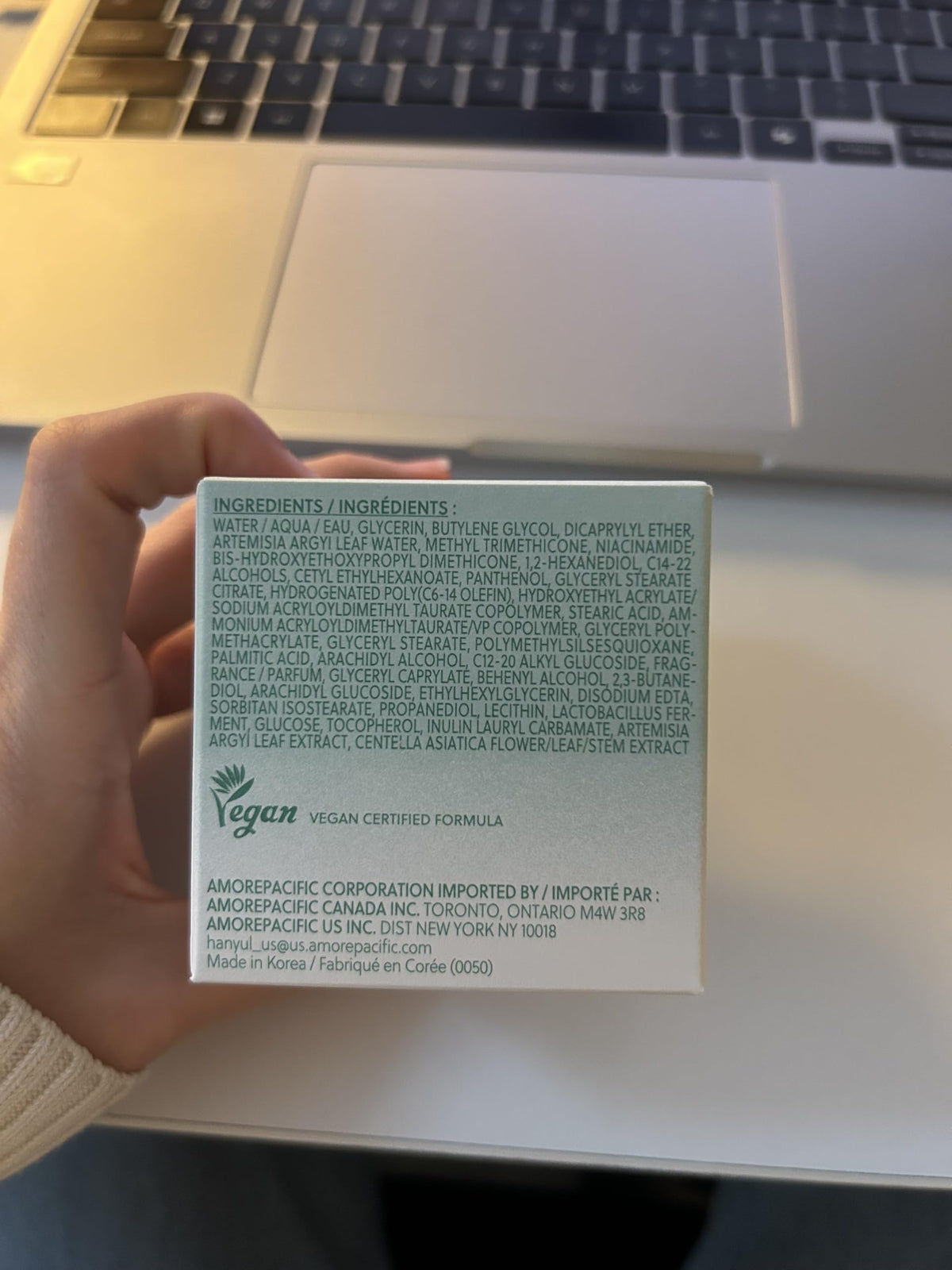 Hanyul Artemisia gel cream in a skincare flatlay paired with serums and toner